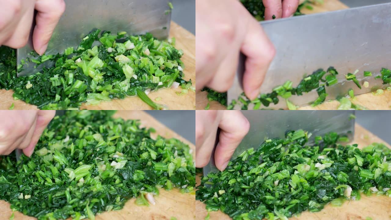 切菠菜并准备烹饪做饭绿色食物砧板