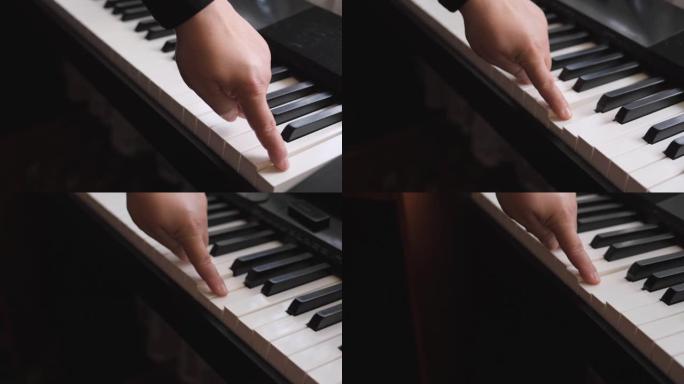 电子琴。手指按下钢琴键。音乐课。