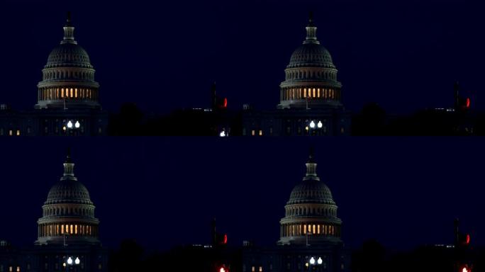 华盛顿特区的美国首都大厦的立面，在夜晚被照亮的圆顶。