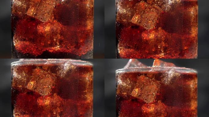可乐苏打水饮料玻璃泡沫，带冰块，微距镜头，特写