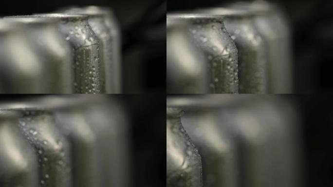 微距摄影湿铝罐，水滴成一排。