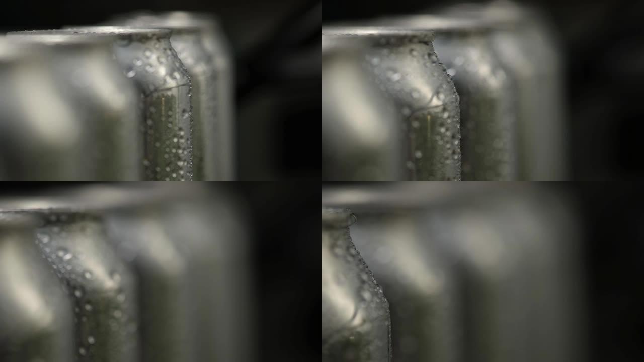 微距摄影湿铝罐，水滴成一排。