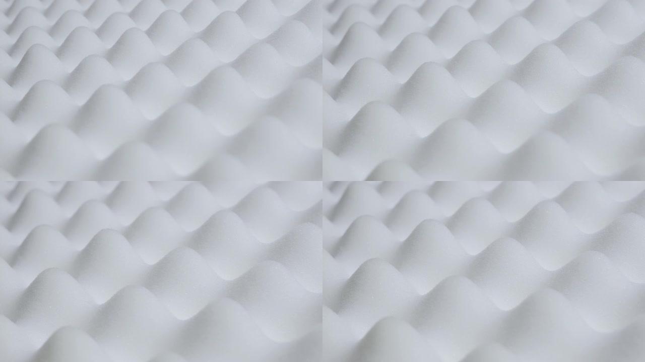 凹凸不平的床垫背部放松表面由现代泡沫制成特写缓慢倾斜4K