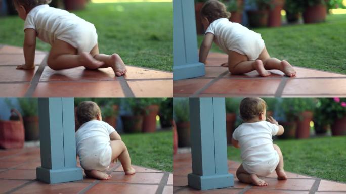 幼儿在户外在家爬行，婴儿学习移动