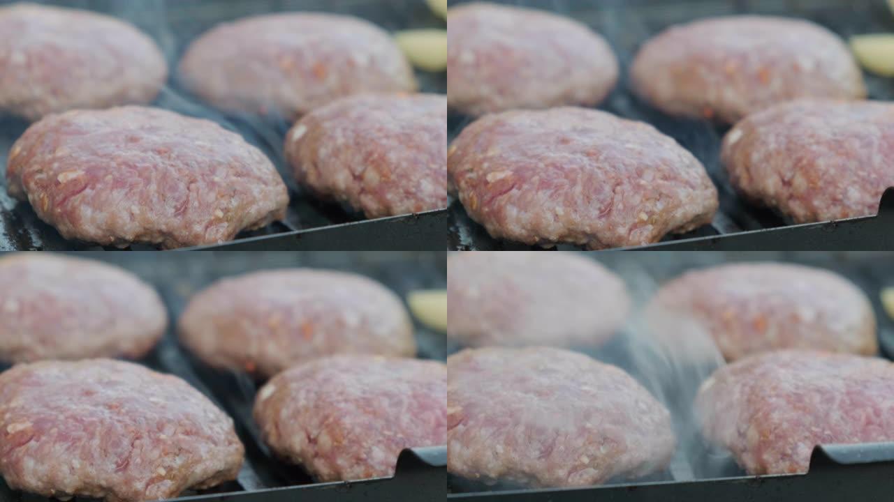 在烤架上用烟炸生猪排，在Mangal上烤肉末，在木炭上烹饪汉堡，天然肉，新鲜猪排，男士食品，大自然上