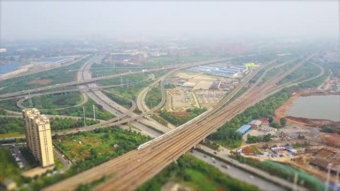 白天时间武汉城市汽车和火车交通枢纽航空全景4k倾斜移位中国