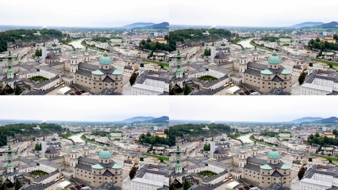 奥地利萨尔茨堡市的市中心，在多云多雾的索默日，从霍恩萨斯堡堡垒2018年8月俯视图。