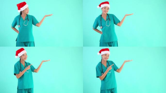 年轻的亚洲医生妇女戴圣诞帽