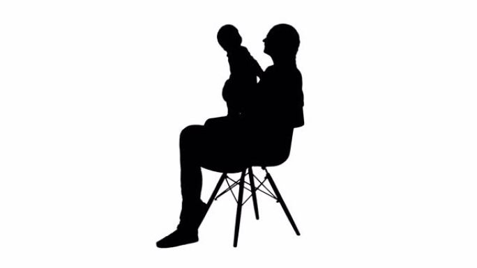 剪影妈妈和可爱的婴儿坐在椅子上