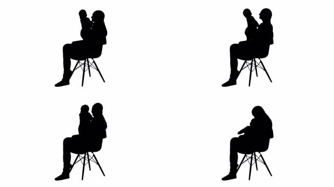 剪影妈妈和可爱的婴儿坐在椅子上
