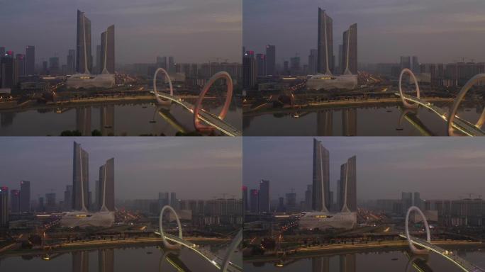 暮光之夜照明南京市国际青年文化中心人行滨江大桥空中全景4k中国