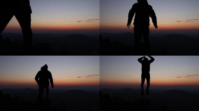 为了庆祝在日落时分征服了贝斯基迪山脉的一座山顶，年轻人进行了一次胜利的飞跃。自由。凡的生活。徒步旅行