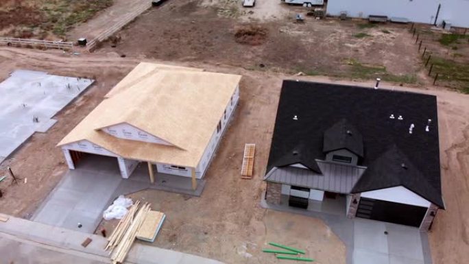 正在建造房屋和房屋的新分区的空中无人机镜头
