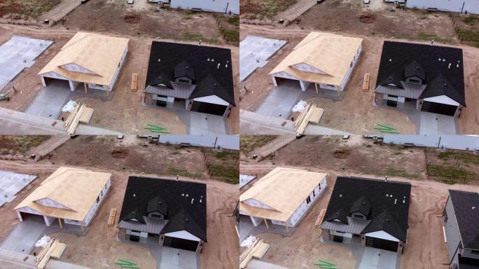 正在建造房屋和房屋的新分区的空中无人机镜头