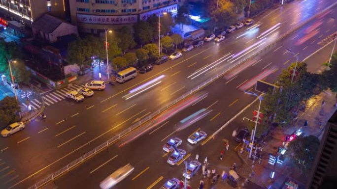长沙市夜间繁忙交通街出租车高峰屋顶延时全景4k中国