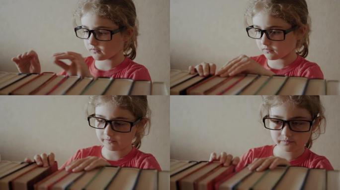 小女孩选择书架上的书。戴着眼镜的年轻女学生从书架上拿书，翻阅图书馆的书页。读书爱好。