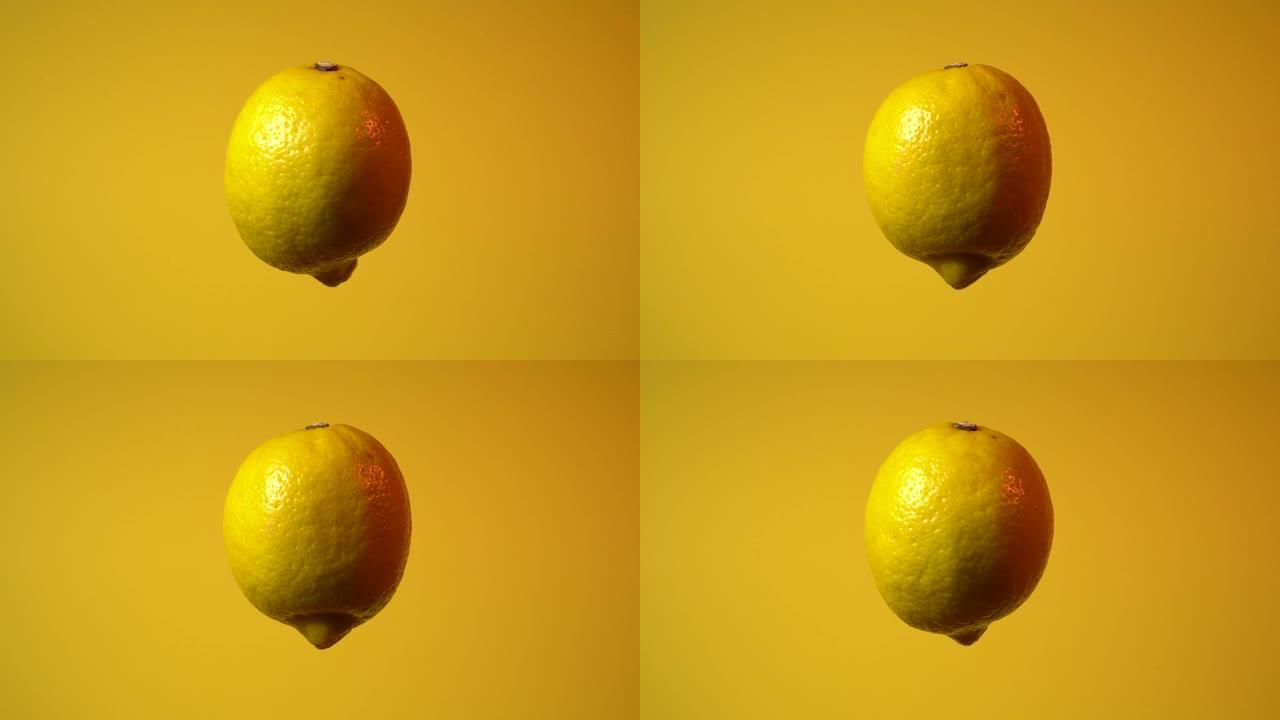 柠檬。柠檬水果漂浮在空中并绕垂直轴旋转的视频。