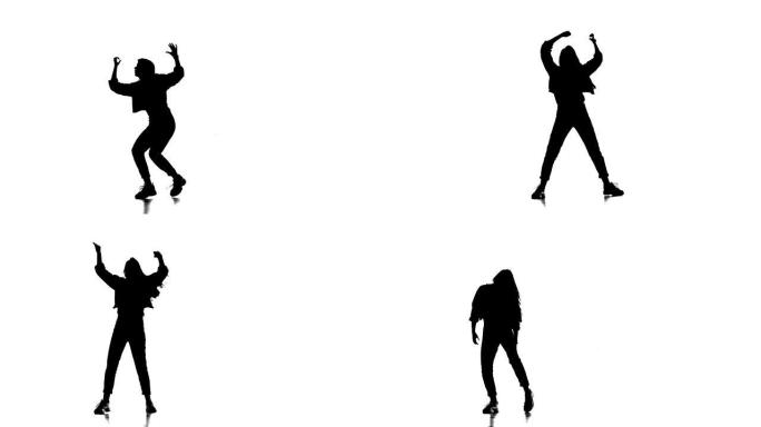 白色背景上的黑色剪影，跳嘻哈舞的女孩，街舞，霹雳舞