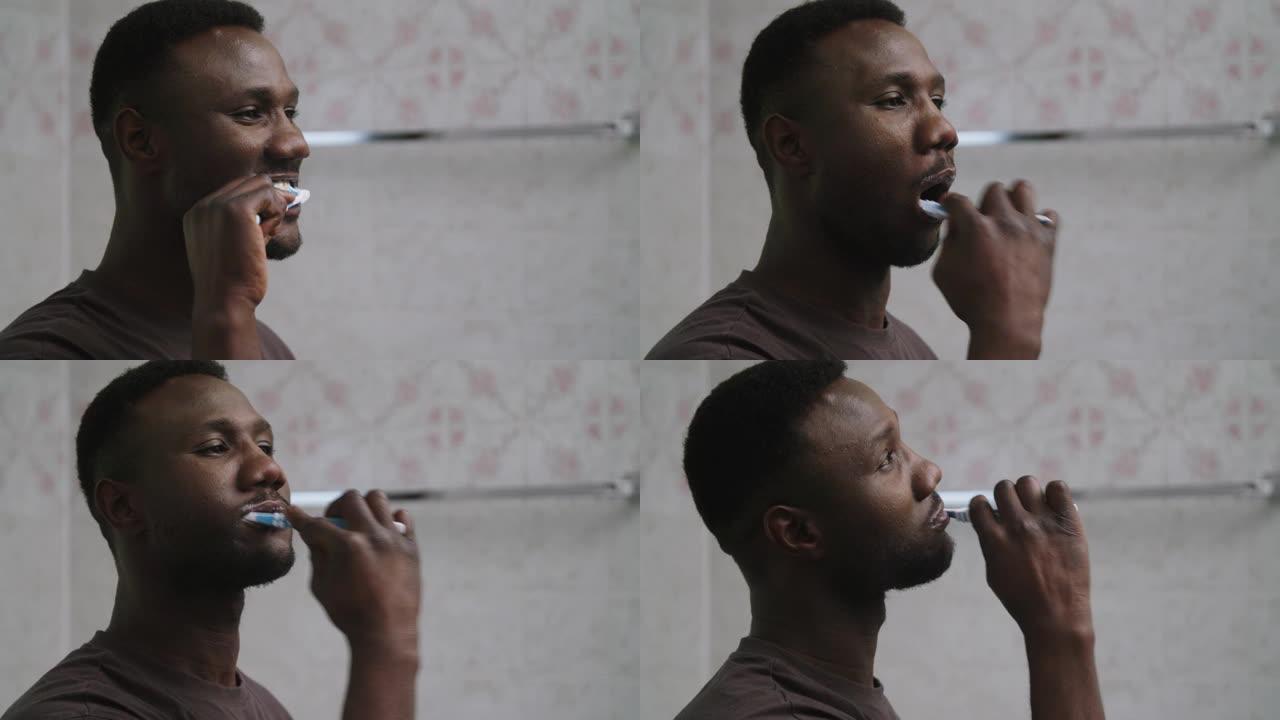 年轻黑人刷牙的轮廓