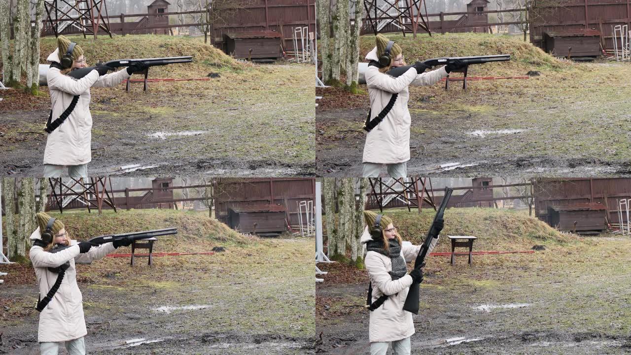 女孩用猎枪向射击场的目标射击。墨盒外壳12口径