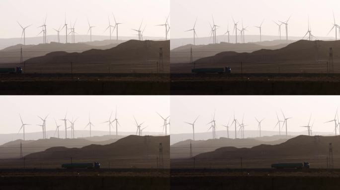 青海戈壁滩风力发电大风车和大货车