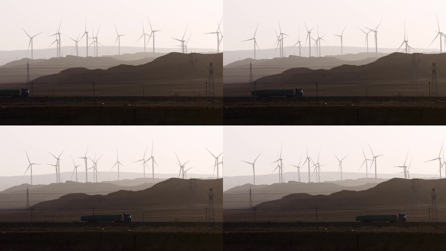 青海戈壁滩风力发电大风车和大货车