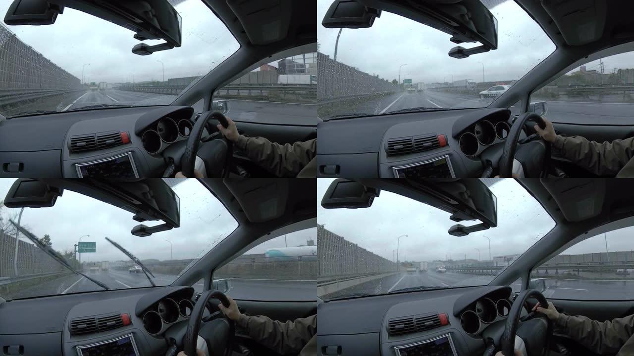 驾车穿越多雨的高速公路