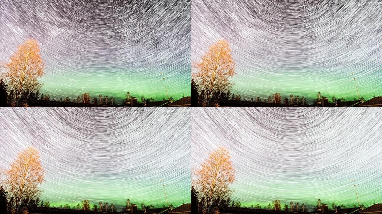 星星小径和北极光令人惊叹的北极光紫色天空延时在芬兰，斯堪的纳维亚半岛在家庭屋顶上有许多流星和铱卫星在