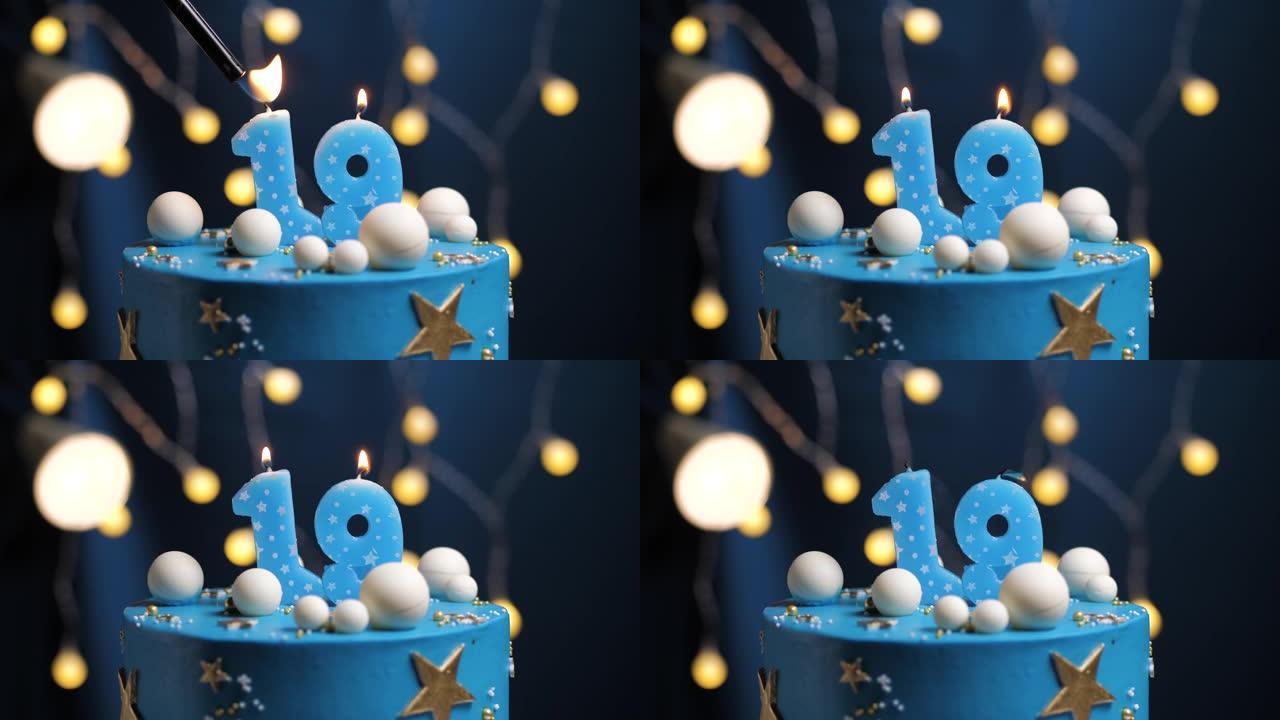 生日蛋糕编号19星星天空和月亮概念，蓝色蜡烛被打火机点燃，然后吹灭。如果需要，请在屏幕右侧复制空间。