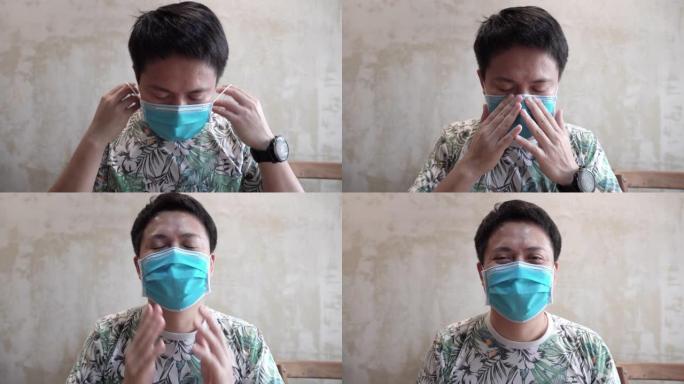 亚洲男子戴着面具微笑在新型冠状病毒肺炎的电晕病毒情况。