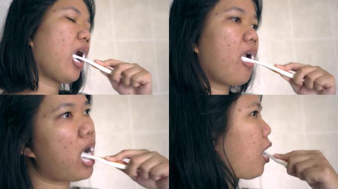 亚洲妇女刷牙