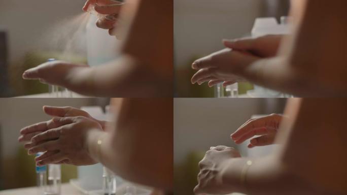 关闭的女人手握和使用一瓶酒精70% 喷雾洗手与复印空间。