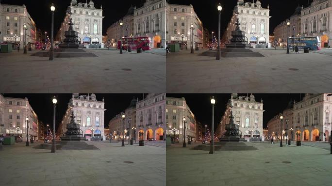 英国伦敦市中心的皮卡迪利广场，夜晚人迹罕至，车水马龙