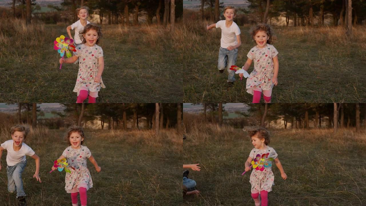 在田野里奔跑的可爱的小女孩。她手里拿着玩具风车，随风旋转。