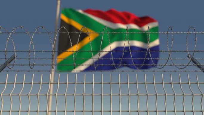 反对挥舞着南非国旗的铁丝网