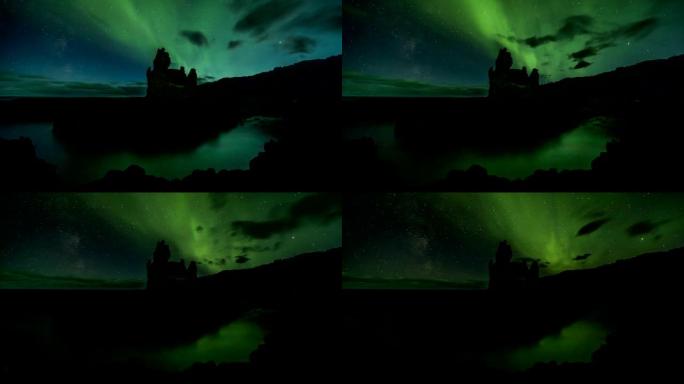北极光北极光在冰岛的Londrangar岩层上延时