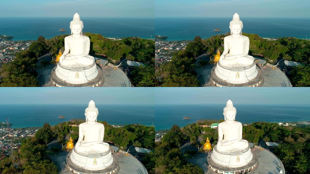 鸟瞰图无人机在泰国普吉岛高山上拍摄大佛像