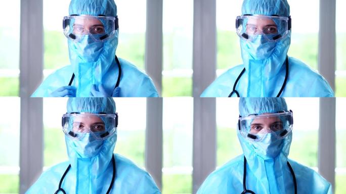女医务工作者，医生或护士的肖像，穿着特殊的防护服，口罩，眼镜。冠状病毒流行病。在白色背景上。冠状病毒