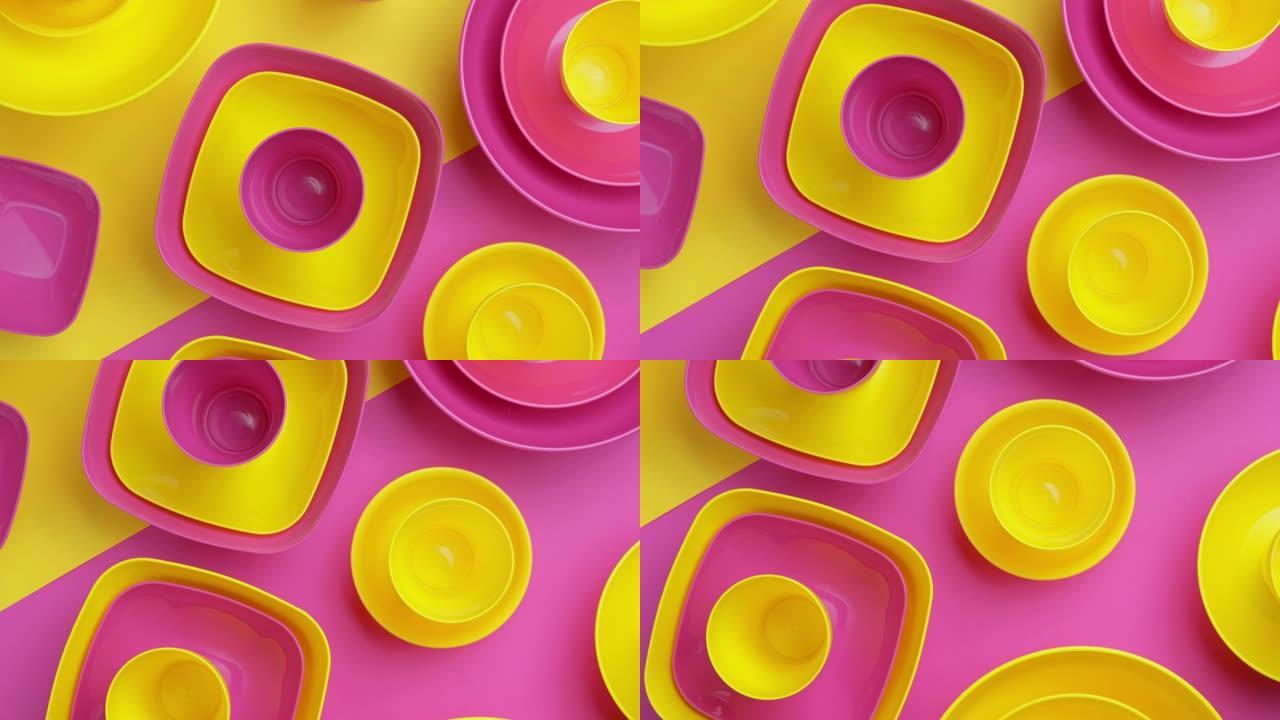 粉色黄色彩色塑料水碗纹理背景