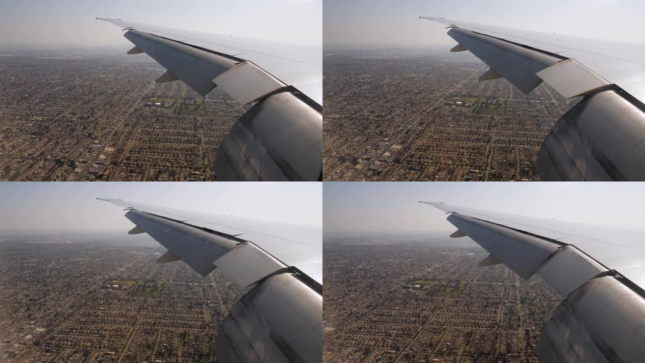 从飞机飞往洛杉矶降落在建筑物和房屋上的视野