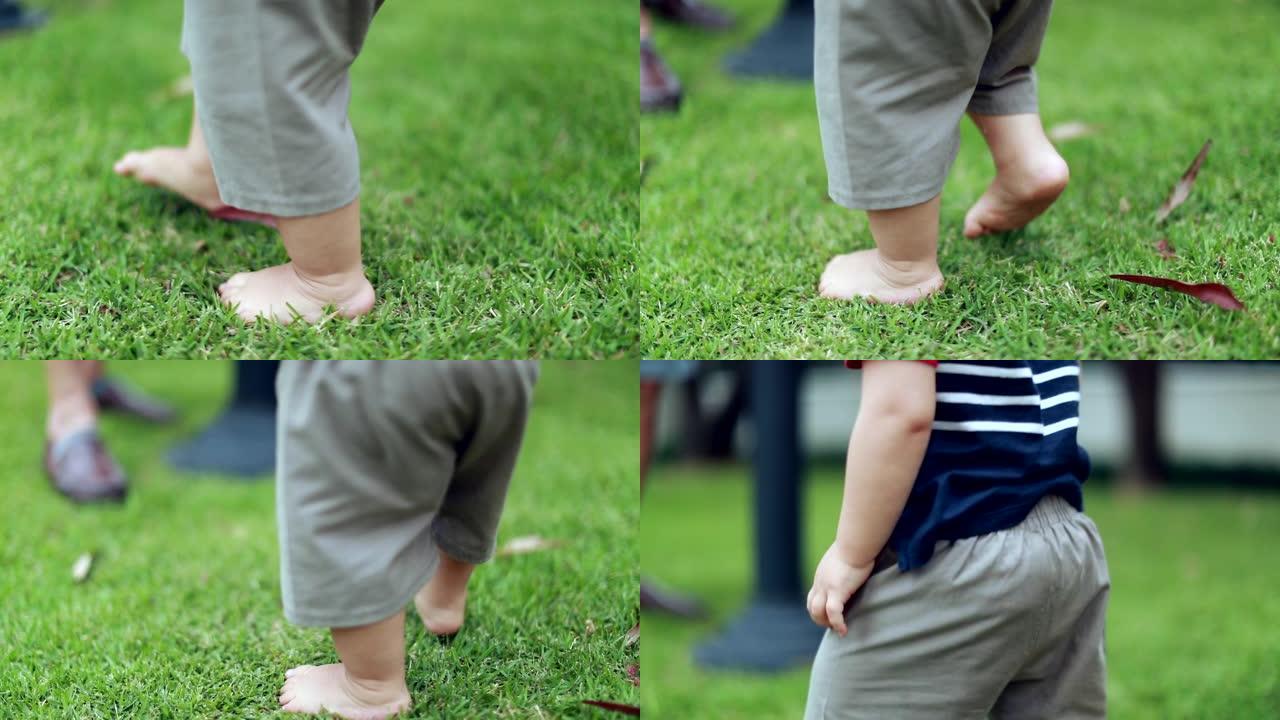 婴儿婴儿赤脚行走户外感觉草草坪