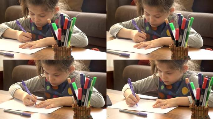 可爱的小女孩在白纸上学习。家庭作业