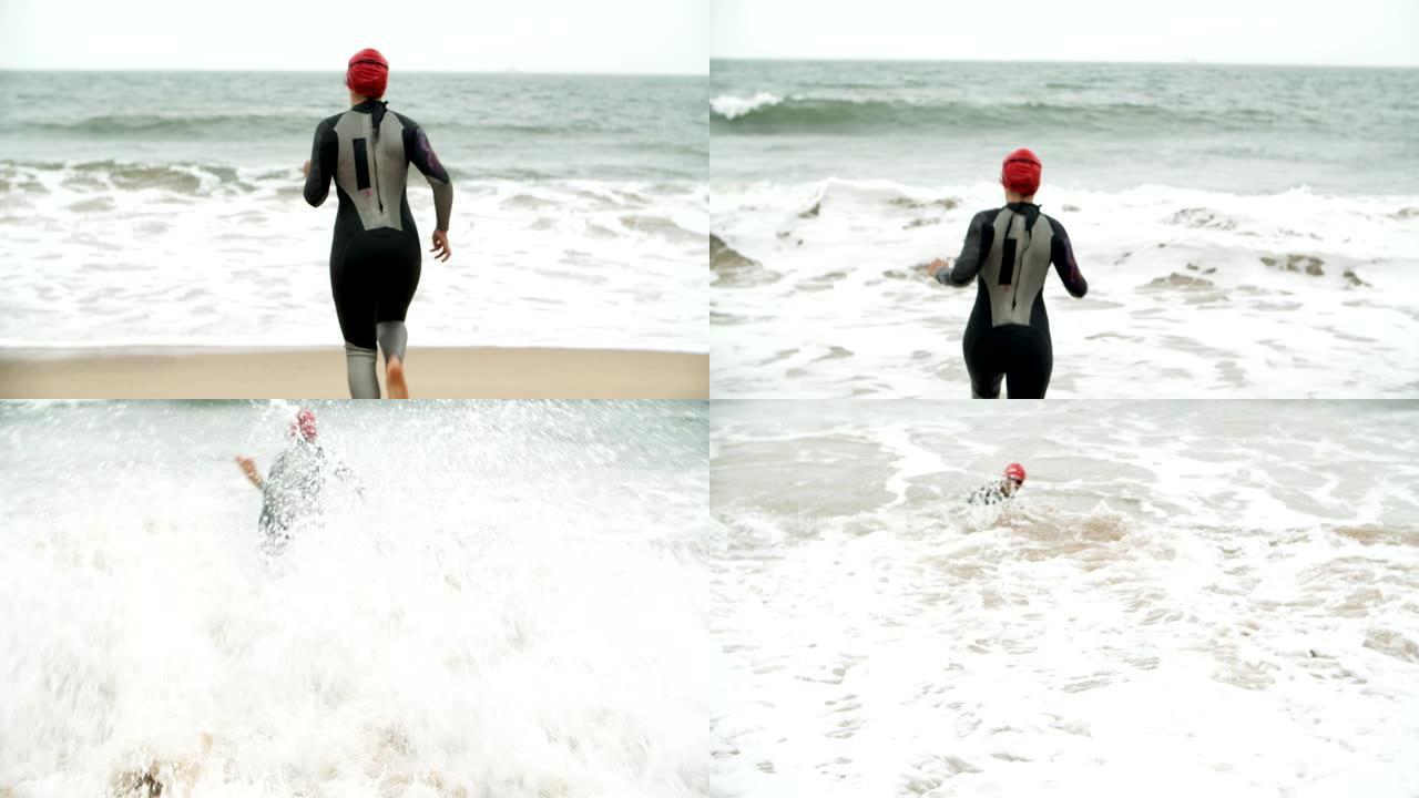 在海滩上跑步的女游泳者