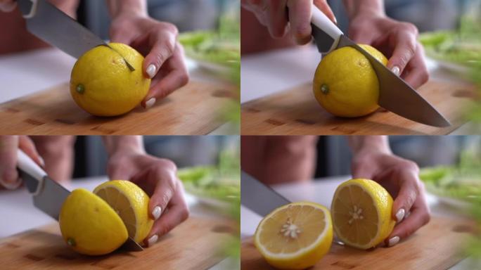 船上用菜刀切割新鲜柠檬的女人的手的特写。