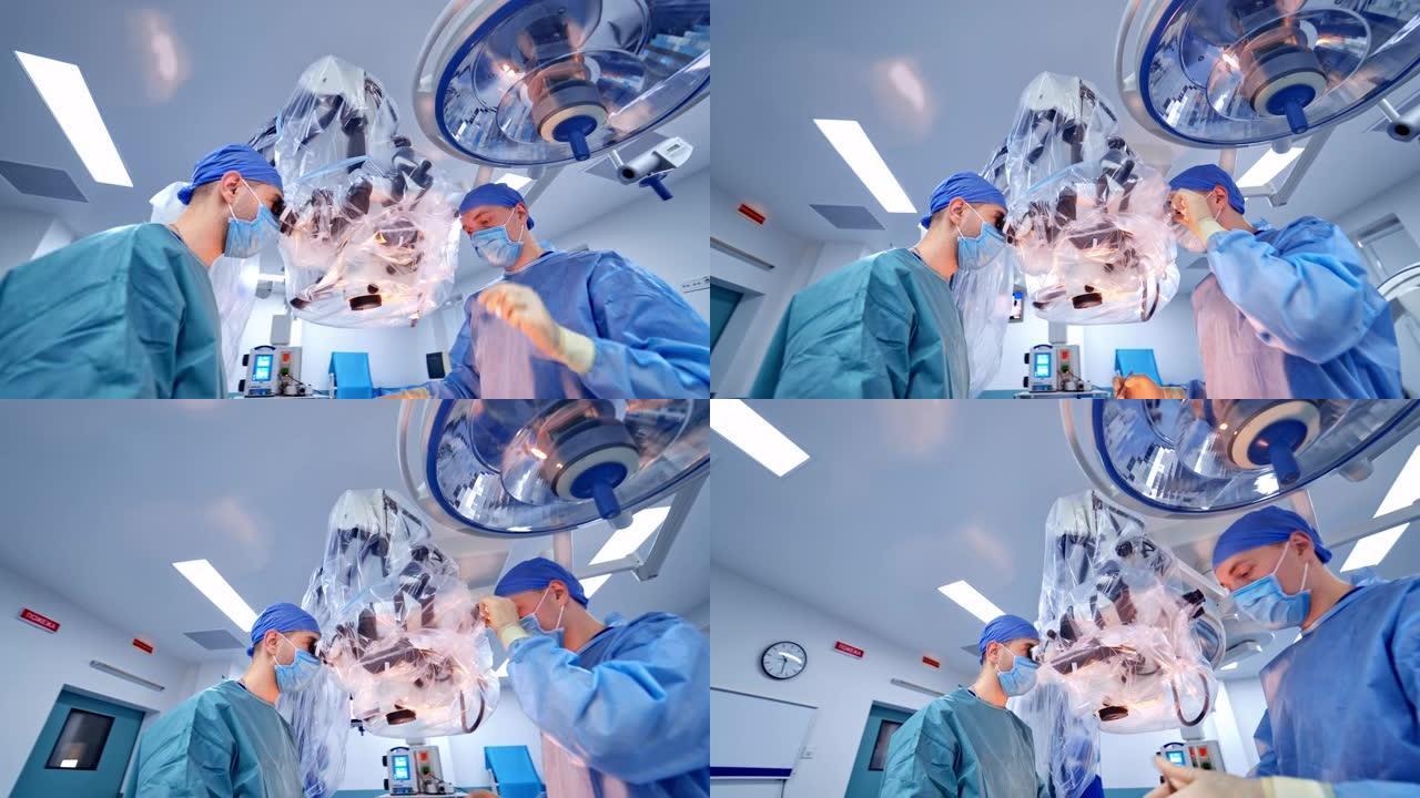 两名外科医生使用现代设备进行复杂的手术。