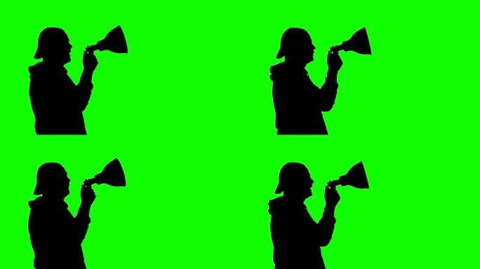 黑色剪影的抗议者拿着扩音器，呼喊口号，在绿色背景。抗议，集会，示威活动的积极分子