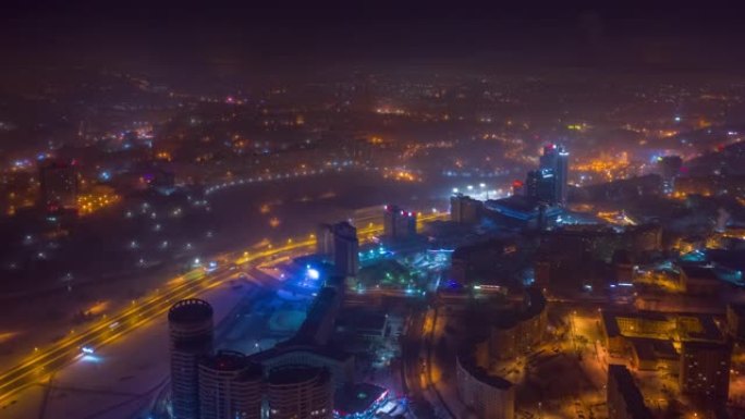 夜间冬季照明明斯克市中心空中全景4k延时白俄罗斯