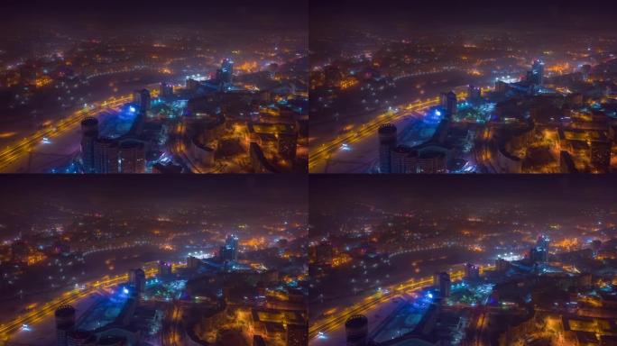 夜间冬季照明明斯克市中心空中全景4k延时白俄罗斯