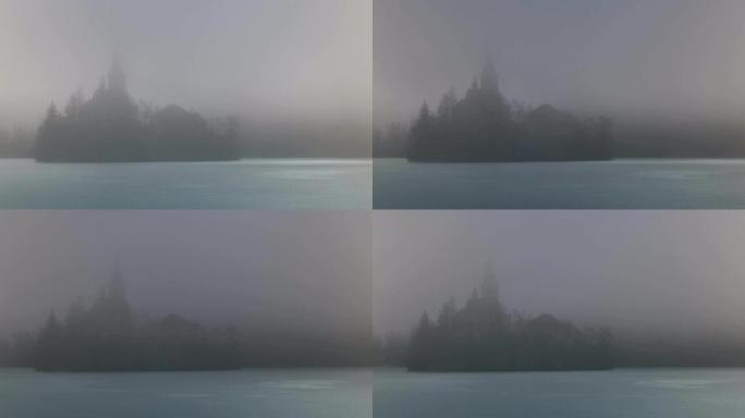 布莱德湖岛在雾中，冬天有冰湖。UHD 4k延时