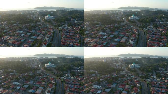 由于冠状病毒大流行，在封锁期间，沉默之城和很少的汽车在马来西亚沙巴州哥打基纳巴卢穿过相当大的空间。空